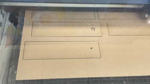 Laser-cut cardboard prototype confirming geometry