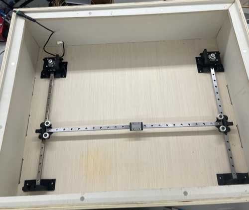 CoreXY rails and carriages mounted inside the enclosure